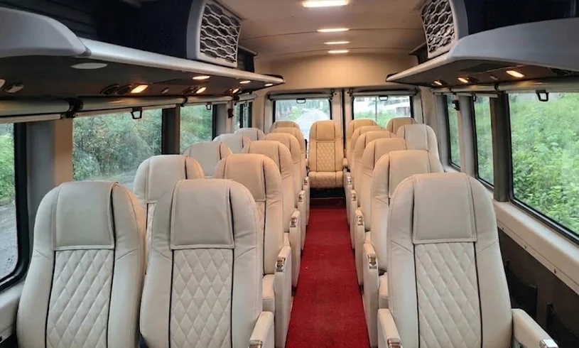Interior of a 17 seater Force Urbania with cream pushback seats